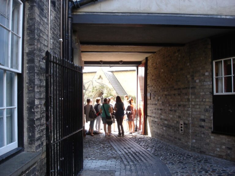 Visitors outside the historic Eagle Pub, Cambridge